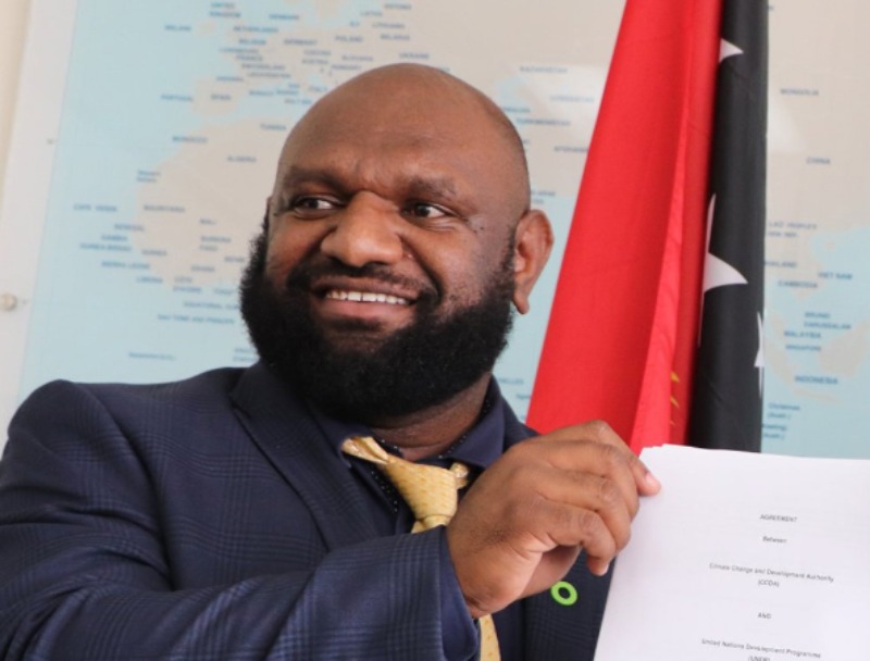 CLIMATE CHANGE BOSS SUSPENDED OVER CORRUPTION ALLEGATIONS