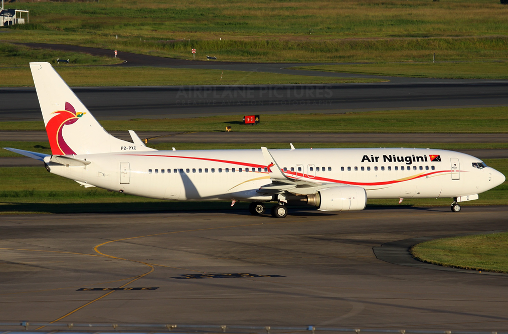 AIR NIUGINI BOEING 737 STRUCK BY GROUND SERVICES VEHICLE IN MANILA