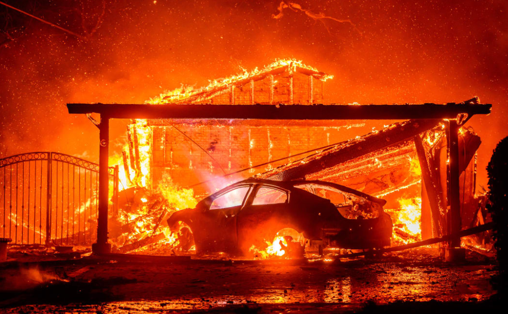 TWO DEAD, 70,000 PEOPLE FLEE AS DEADLY LOS ANGELES FIRES RAGE