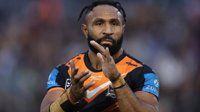 JUSTIN OLAM HANGS UP HIS BOOTS