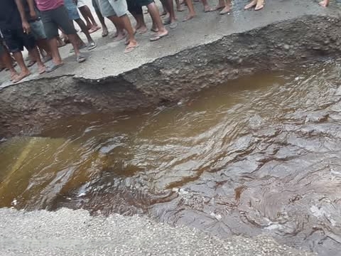 PORTION OF NATIONAL HIGHWAY DAMAGED BY RAIN