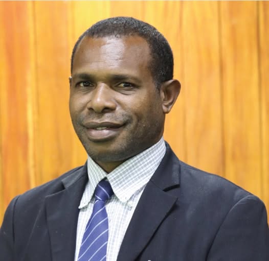 MINISTER PETER PRESENTS FUNDS TO BLIND CENTRE