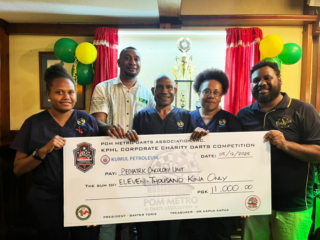 SP BREWERY CORPORATE DARTS TEAM DONATES TO CANCER UNIT