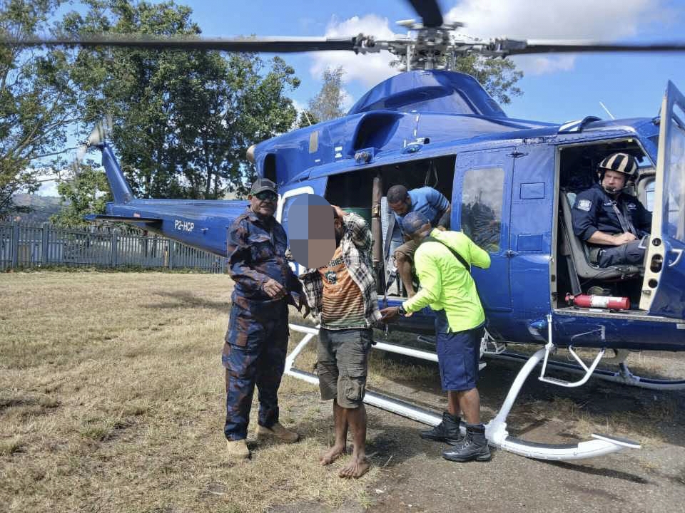 POLICE CHOPPER RESCUES SURVIVOR OF SARV IN REMOTE VILLAGE